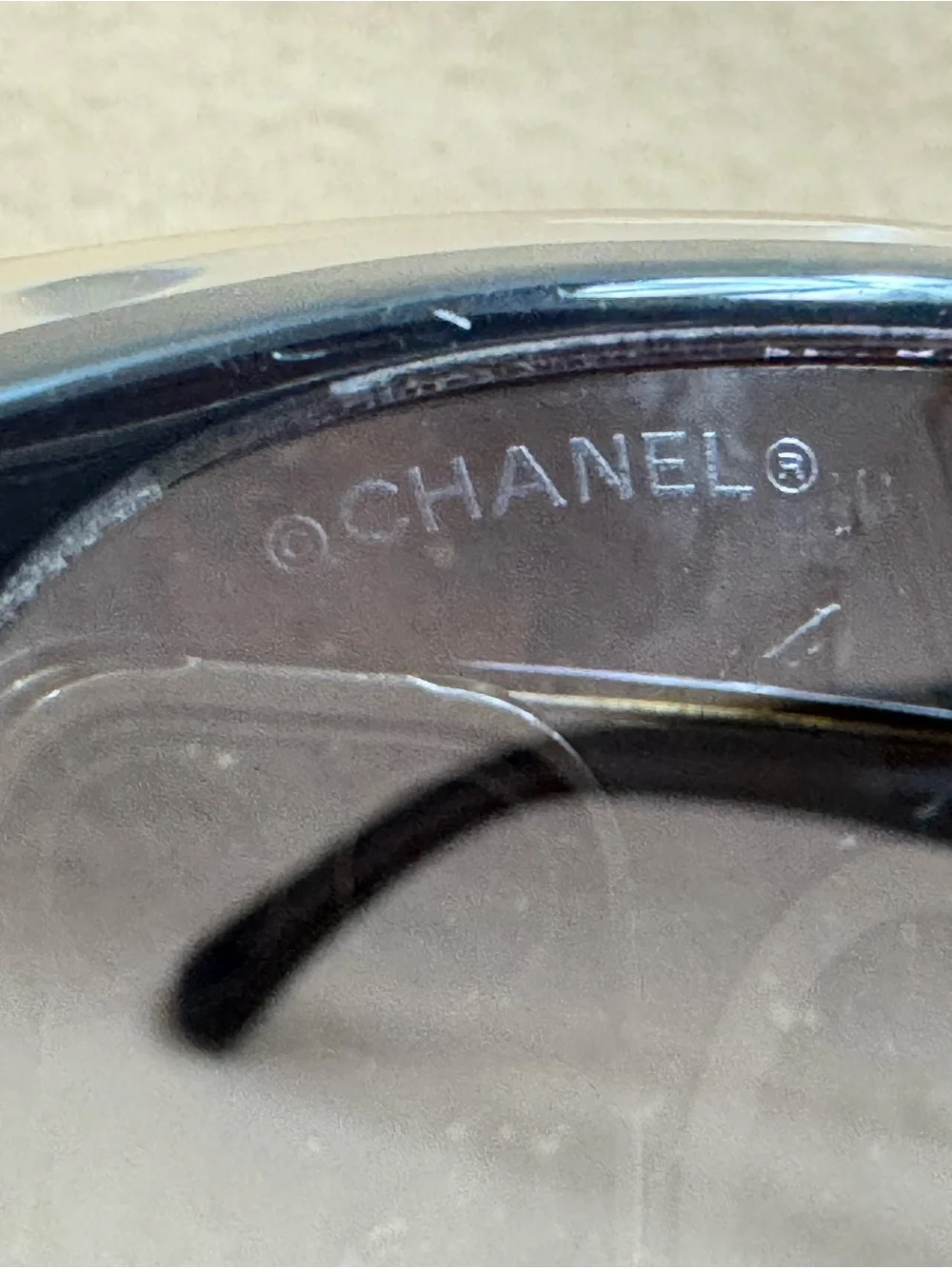 CHANEL Black Sunglasses with Iridescent CC Emblem